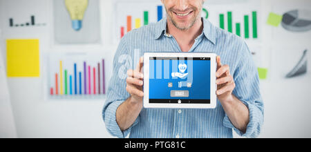 Image composite de businessman showing digital tablette avec écran vide dans creative office Banque D'Images