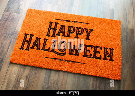 Happy Halloween Orange Mat Bienvenue sur fond de plancher de bois. Banque D'Images