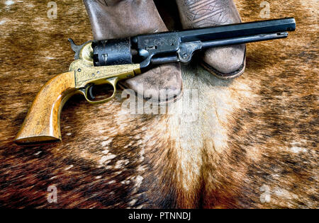 Bottes de cow-boy et de l'ouest cowboy pistolet. Banque D'Images