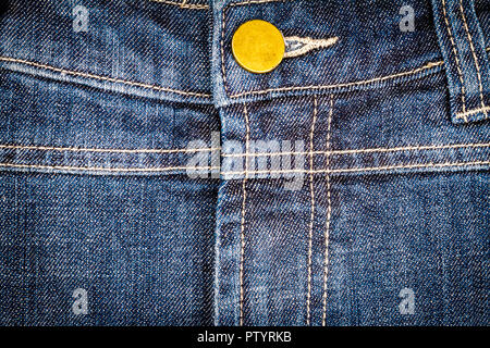 Denim bleu jeans usés texture avec suture et bouton. Abstract background texture jeans Banque D'Images