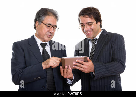 Portrait of happy young et senior businessman Persique smilin Banque D'Images