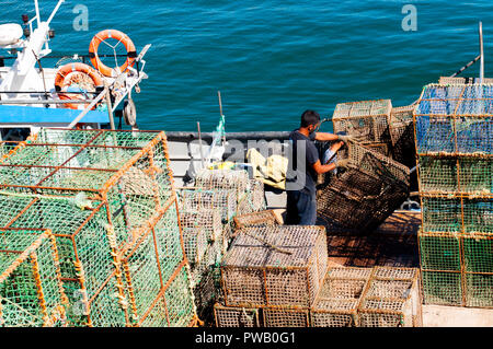 Emballage pêcheur à la pêche au poulpe pièges Banque D'Images