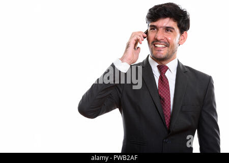 Young happy man tout en parlant persan Banque D'Images