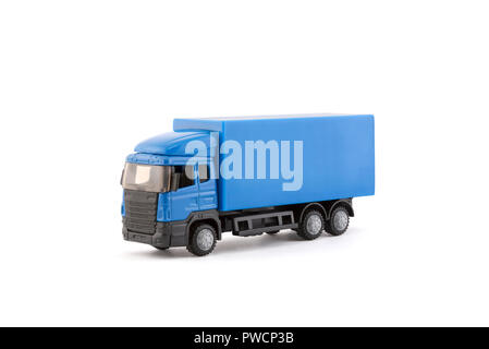 Miniature camion bleu sur fond blanc Banque D'Images