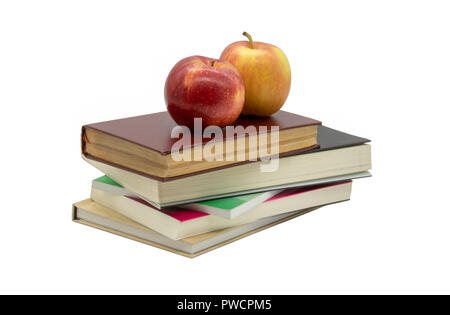 Une vue de l'éducation de deux pommes sur peu de livres Banque D'Images