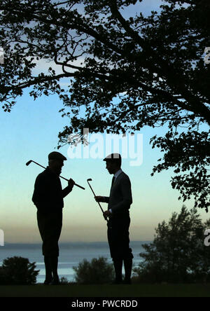 Des golfeurs dans le monde Hickory Open Championships à Longniddry Club de Golf sur la Côte d'Ecosse Golf, East Lothian. Banque D'Images