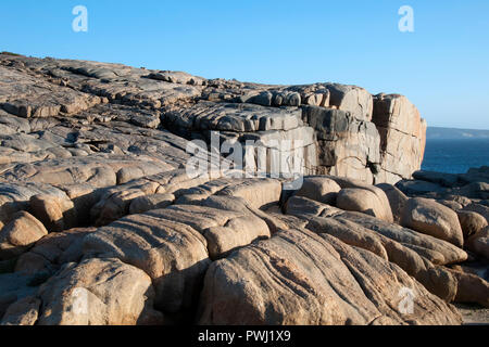 L'Australie Albany, formations rocheuses sur "l'écart" pointe torndirrup national park au coucher du soleil Banque D'Images