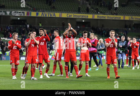 Pays de Galles' Ashley Williams (centre) après le coup de sifflet final au cours de l'UEFA Ligue des Nations Unies, Ligue B, Groupe 4 match à l'Aviva Stadium de Dublin. ASSOCIATION DE PRESSE Photo. Photo date : mardi 16 octobre, 2018. Voir l'ACTIVITÉ DE SOCCER Histoire République. Crédit photo doit se lire : Liam McBurney/PA Wire. Banque D'Images