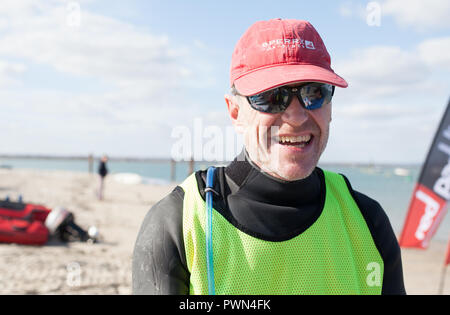 Portrait d'une pagaie boarder après une course Banque D'Images