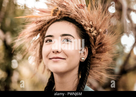 Dreamy Young Asian woman posing on camera Banque D'Images