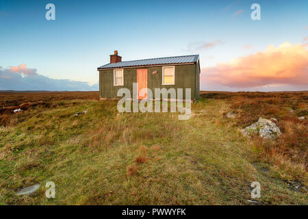 Une hutte sheiling sur la lande sur l'île de Lewis dans les Hébrides extérieures Banque D'Images