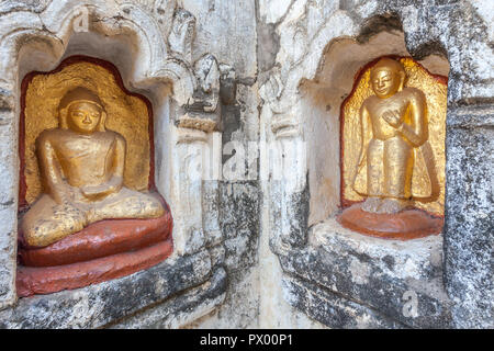Détail de statues de Bouddha au temple de Mahabodi à Bagan, Myanmar Banque D'Images