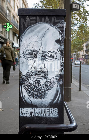 Reporters Sans Frontières stencil graffiti sur une rue de Paris. Banque D'Images