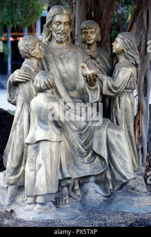 Phuc fils monastère catholique. Jésus : Laissez les petits enfants venir à moi. Statue. Ba Ria. Le Vietnam. Banque D'Images