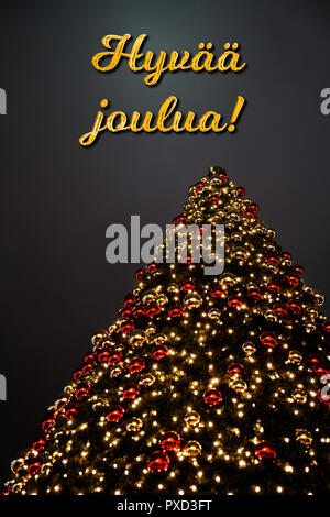 Le Texte Finnois Hyvaa Joulua Signifie Merry Christmas Qui Est En Face D Un Poinsettia Rouge La Carte De Vœux Des Fetes Parfaites Photo Stock Alamy