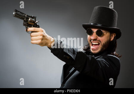 Concept vintage avec l'homme vêtu de noir top hat Banque D'Images