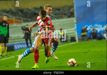 San Sebastian, Espagne. 22 octobre, 2018. Portu de Gérone pour duels la balle avec Kevin Rodrigues de Real Sociedad lors de la ligue espagnole match de football entre le Real Sociedad et Gérone au stade Anoeta le 22 octobre 2018 à San Sebastian, Espagne Credit : CORDON PRESS/Alamy Live News Banque D'Images