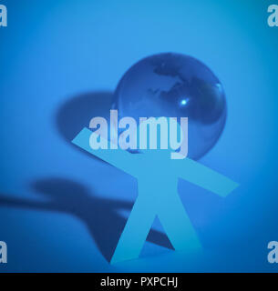 Papier élégant homme debout près de la planète Banque D'Images