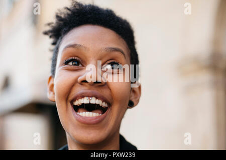 Portrait of laughing young woman Banque D'Images