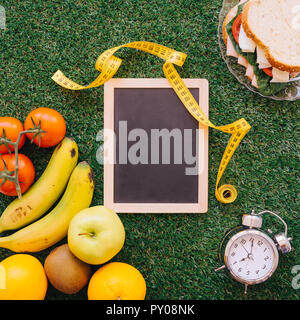 L'alimentation et de l'horloge en ardoise Banque D'Images