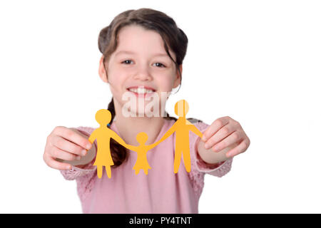 Girl holding paper chain family Banque D'Images