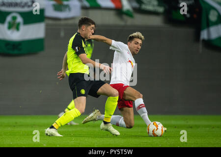 Leipzig, Allemagne. 25 octobre, 2018. Du celtique Ryan Christie (L) le dispute à la Leipzig Kevin Kampl lors d'un troisième match dans le groupe B de l'UEFA Europa League entre le RB Leipzig de l'Allemagne et de l'Ecosse Celtic FC, à Leipzig, en Allemagne, le 25 octobre 2018. Leipzig a gagné 2-0. Crédit : Kevin Voigt/Xinhua/Alamy Live News Banque D'Images