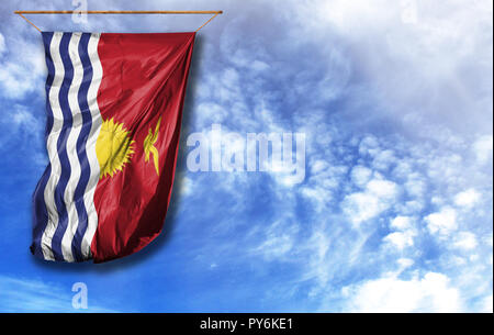 Pavillon de Kiribati. Drapeau vertical, contre le ciel bleu avec place pour votre texte Banque D'Images