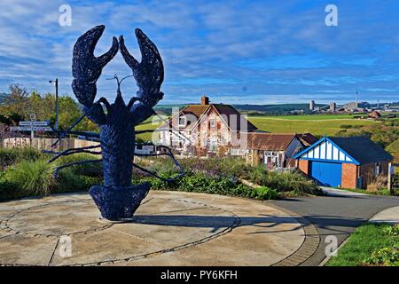 Capturer l'entrée pointe sur le marche unique jusqu'au port de la North Yorkshire village de pêcheurs de Staithes. Banque D'Images