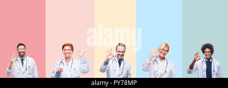 Collage des bandes colorées sur les médecins professionnels fond isolé positif souriant faisant ok signe avec la main et des doigts. Expression réussie. Banque D'Images