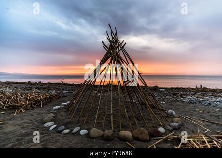 Lever du soleil sur la plage de Motril, en Espagne, en octobre. Banque D'Images