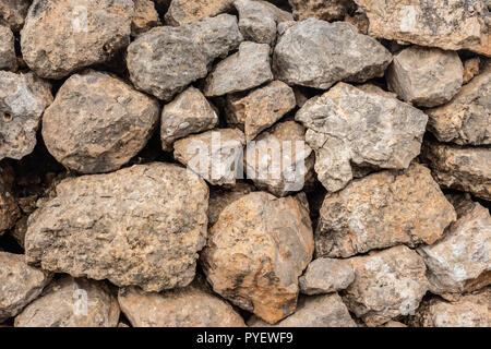 Pierre transparente Orange vieux mur de pierre texture background. L'horizontale Banque D'Images