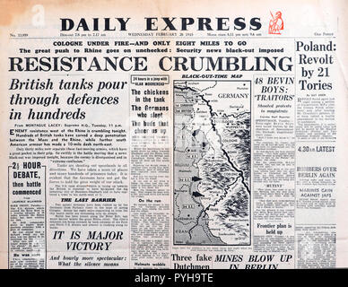 Daily Express gros titre de journal "L'effritement de la résistance - réservoirs pour l'intermédiaire de défense dans des centaines' Seconde Guerre mondiale l'Angleterre le 28 février 1945 Banque D'Images