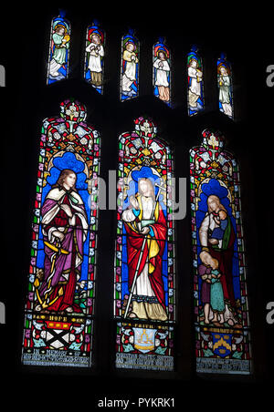 L'espoir, la foi et la charité des vitraux, l'église All Saints, Harpole, Northamptonshire, England, UK Banque D'Images