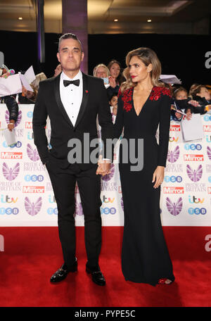 Robbie Williams et Ayda Field au cours de la fierté de la Grande-Bretagne Awards 2018, en partenariat avec le BST, honorant les héros méconnus et reconnaissant les réalisations extraordinaires de gens ordinaires, qui s'est tenue à l'hôtel Grosvenor House, Londres. Banque D'Images