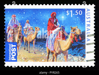 L'AUSTRALIE - circa 2011 : un timbre de Noël utilisée montrant les trois rois à cheval sur des chameaux, vers 2011 Banque D'Images