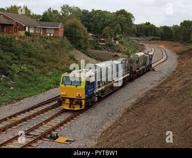 Network Rail MPV aucun DR 98982 quitte la Direction Générale de Printemps Wigan mardi après-midi le dépôt d'entretien 2.10.18. Cw 6410 Banque D'Images