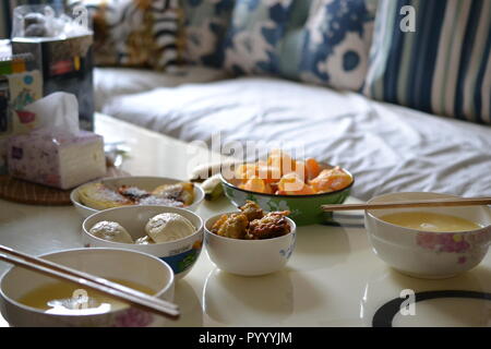 Style Chinois petit-déjeuner fait maison dans la salle de séjour, du Shaanxi, Chine Banque D'Images