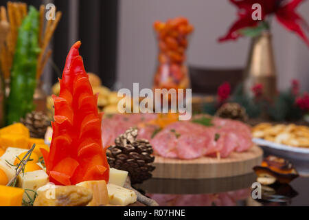 Parti de délicieux amuse-gueules avec des décorations de fête Banque D'Images