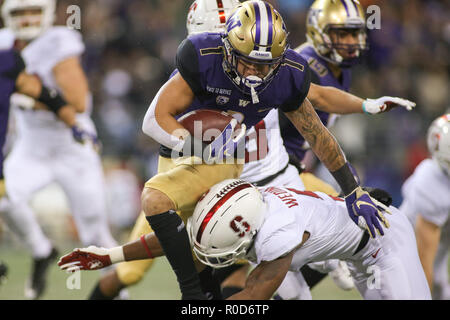 Seattle, WA, USA. 29Th sep 2018. Washington Huskies arrière défensif Byron Murphy (1) est abordé après avoir fait une interception lors d'un match entre le Stanford Cardinal et Washington Huskies au Husky Stadium à Seattle, WA. Sean Brown/CSM/Alamy Live News Banque D'Images