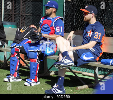 November 3, 2018 - Miami Marlins J.T. Realmuto and Texas Rangers Robinson  Chirinos during a warm up workout session at Les Murakami Stadium on the  campus of the University of Hawaii at