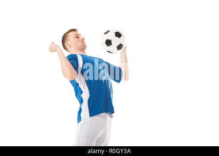 Jeune joueur de foot ball frapper la poitrine avec isolated on white Banque D'Images