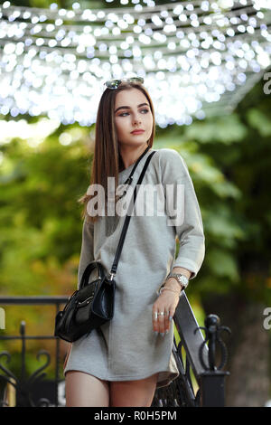 Young woman with rivets bra and leather outfit Stock Photo - Alamy