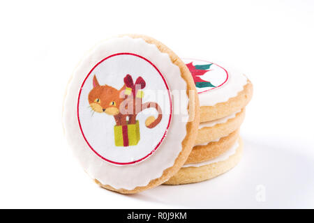 Des biscuits avec un imprimé conception cat Noël isolé sur fond blanc. Banque D'Images
