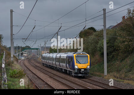 Toute nouvelle classe 331 CAF construit pour former l'UEM Northern Rail arriva en phase de test sur la ligne principale de la côte ouest près de Erquy Banque D'Images