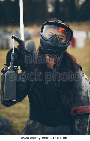 Portrait of happy young woman paintball Portrait of happy young woman paintball