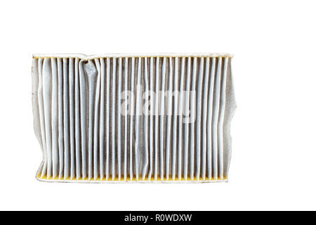 Le changement d'un filtre à pollen cabine voiture . Efficiety haut filtre à air de particules.(ancienne - verso) fond blanc dentelle Banque D'Images