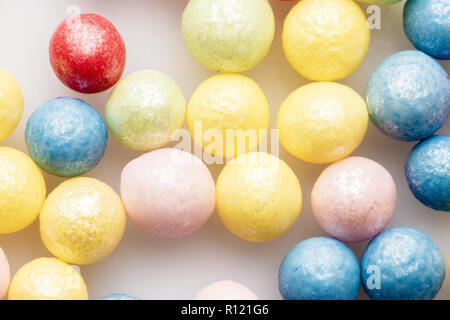 Saupoudre de sucre coloré décoration fond de boulangerie et gâteau Banque D'Images