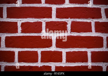 Mur de briques rouges avec de la peinture blanche, la texture de fond. vignette, extérieur Banque D'Images