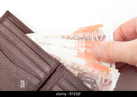 Part chercher de l'argent dans un porte-monnaie Banque D'Images