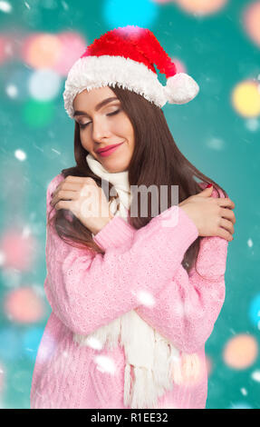 Fille de chandail et christmas hat Banque D'Images